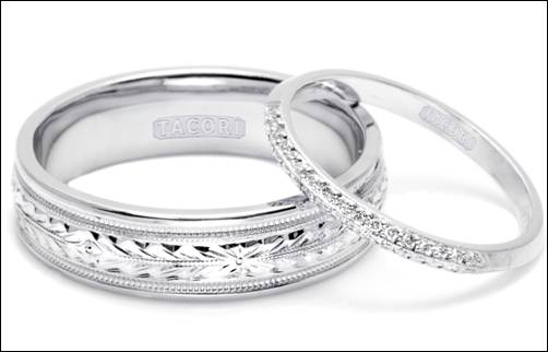 The couple exchanged platinum wedding bands made by TACORI